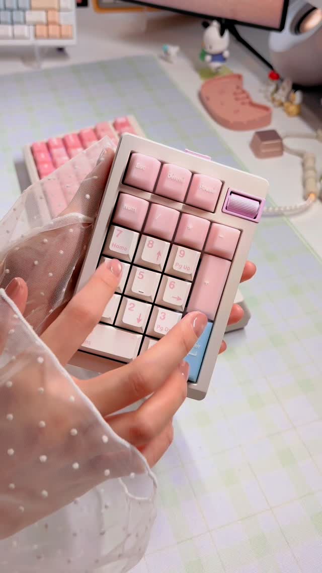 Instagram post by @mango.keebs for Unikeyboards. Caption reads: (ad) father and son 🙂‍↕️the zoom75 tiga + zoompad....