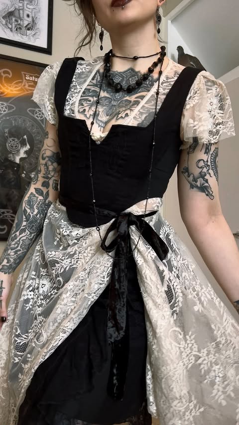 Instagram post by @acanemia for DISTURBIA. Caption reads: [...] Dress: thrifted Corset top & skirt:....