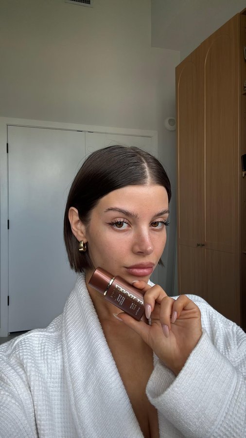 Instagram post by @ashleymariedickerson for St.Tropez. Caption reads: Sun-kissed, minus the sun 🌞 using the new....