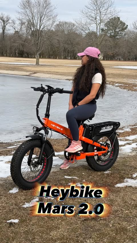 Instagram post by @america.timee for Heybike. Caption reads: #ad 🚴‍♂️ Taking the @heybike_official Mars 2.0....