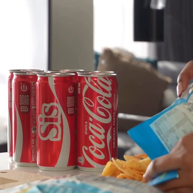Instagram post by @_zintlezee_ for Coca-Cola South Africa. Caption reads: Surprised my squad with a can of Coke that....
