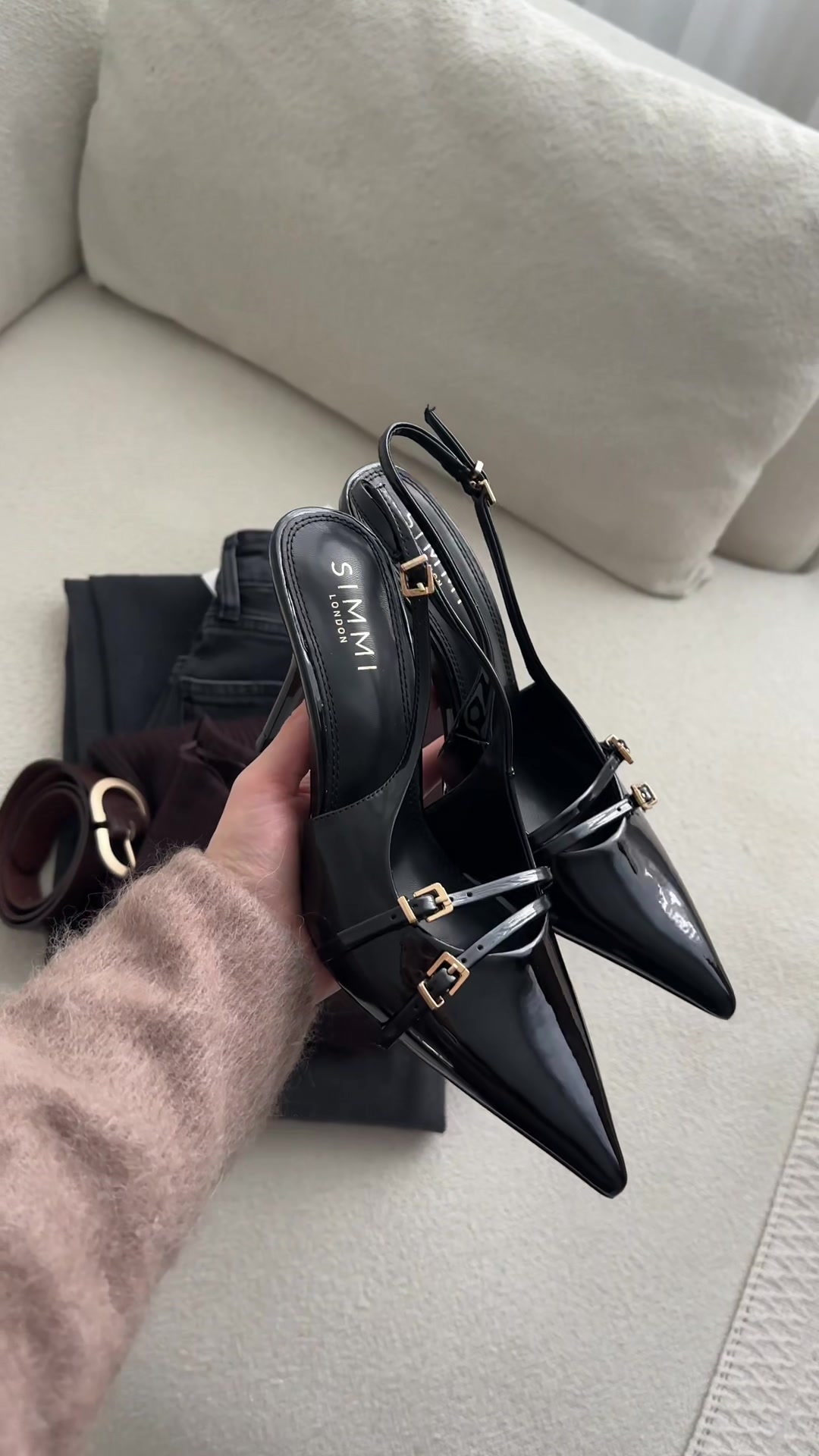 TikTok post by @stylebyjjulia for Simmi London. Caption reads: A chic look 🤎 These heels wow @SIMMILONDON ✨....