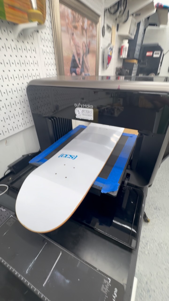 Instagram post by @myerswoodshop for AnkerMake. Caption reads: Customizing a skateboard 🛹 
@eufymake uv printer.