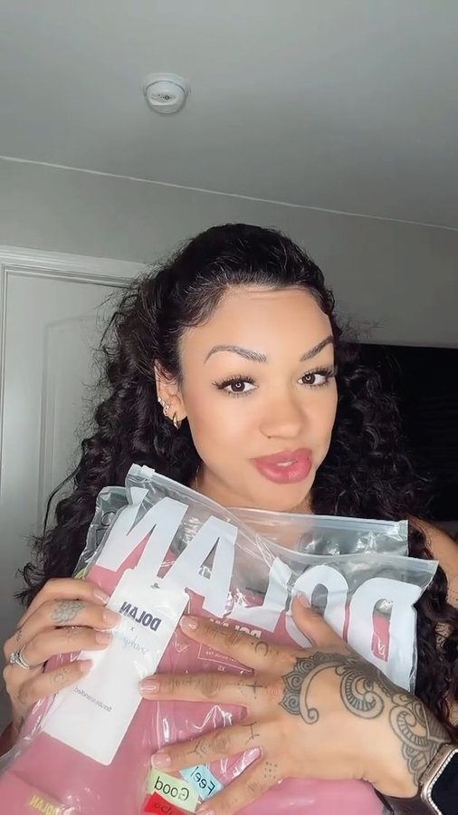 Instagram post by @denisse_thenurse for DOLAN Scrubs. Caption reads: [...] with Snarky Nurses you run!!....