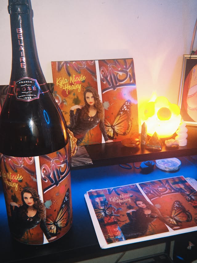 Instagram post by @kylanicolehealey for Luc Belaire. Caption reads: Getting ready for my release ✨✨🦋🦋 Sunday June 28....