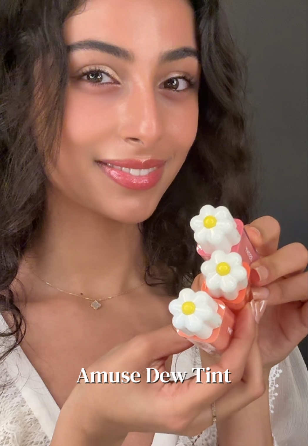TikTok post by @leila_mobin for AMUSE Seoul. Caption reads: [...] the cutest packaging ever!! 🌼💗 AD @AMUSE....