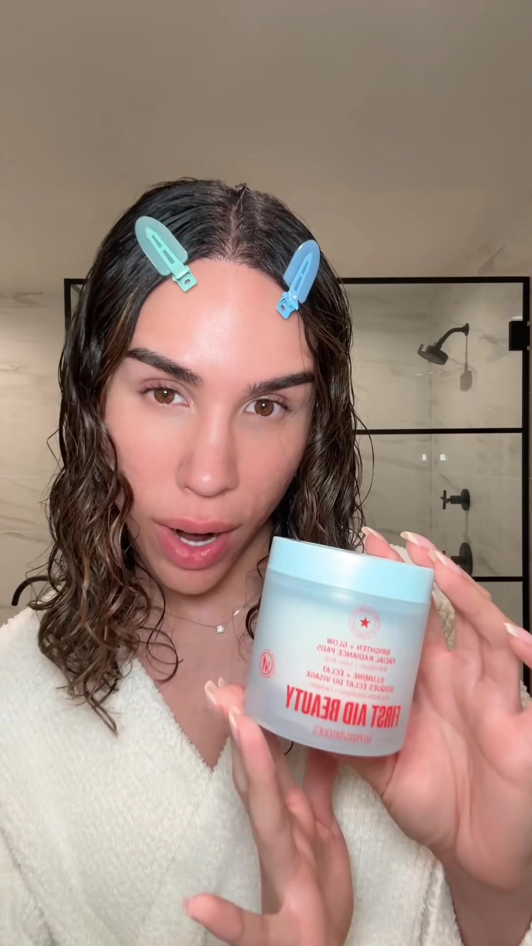 TikTok post by @ariel for First Aid Beauty. Caption reads: [...] for Facial Radiance Pads from @First Aid....