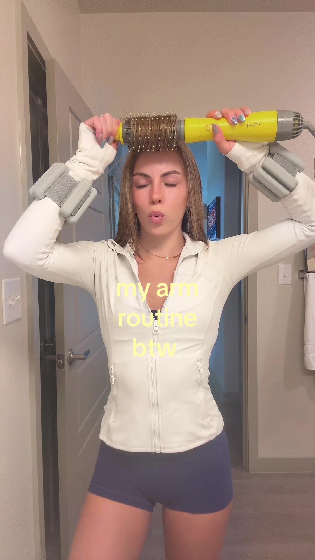 TikTok post by @em.sheldon for Bala. Caption reads: game changer @bala #leanarms #pilatesworkout.