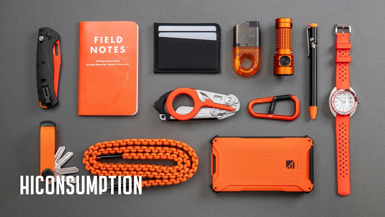 YouTube post by @Hiconsumption for Orbitkey. Caption reads: 13 Must-Have Hi-Vis Orange EDC Essentials.