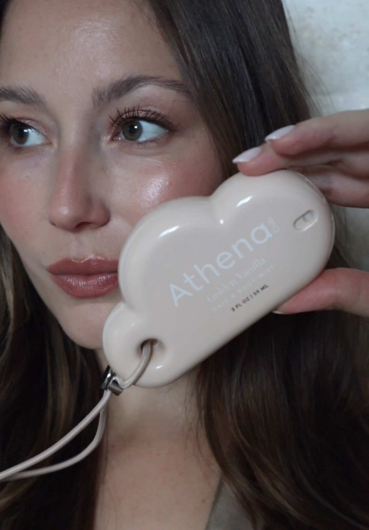 TikTok post by @danahassonn for Athena Club. Caption reads: [...] scent 🍪 So excited to partner with @Athena....