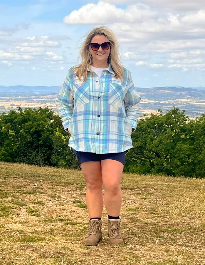 Instagram post by @not_so_grim_up_north for ACAI Outdoorwear. Caption reads: Messy camping hair, don’t care.

Outfit:
Granola....