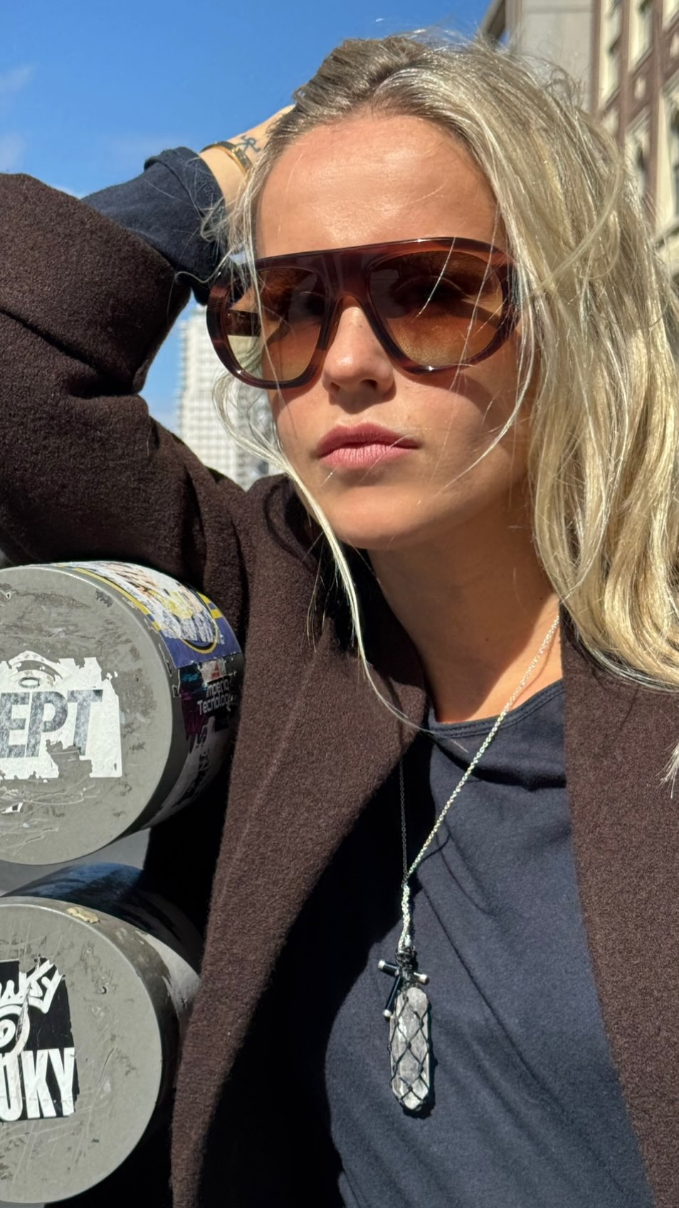 Instagram post by @monicanoz for Sunglass Hut. Caption reads: Publicidad- Sunny days call for the perfect....