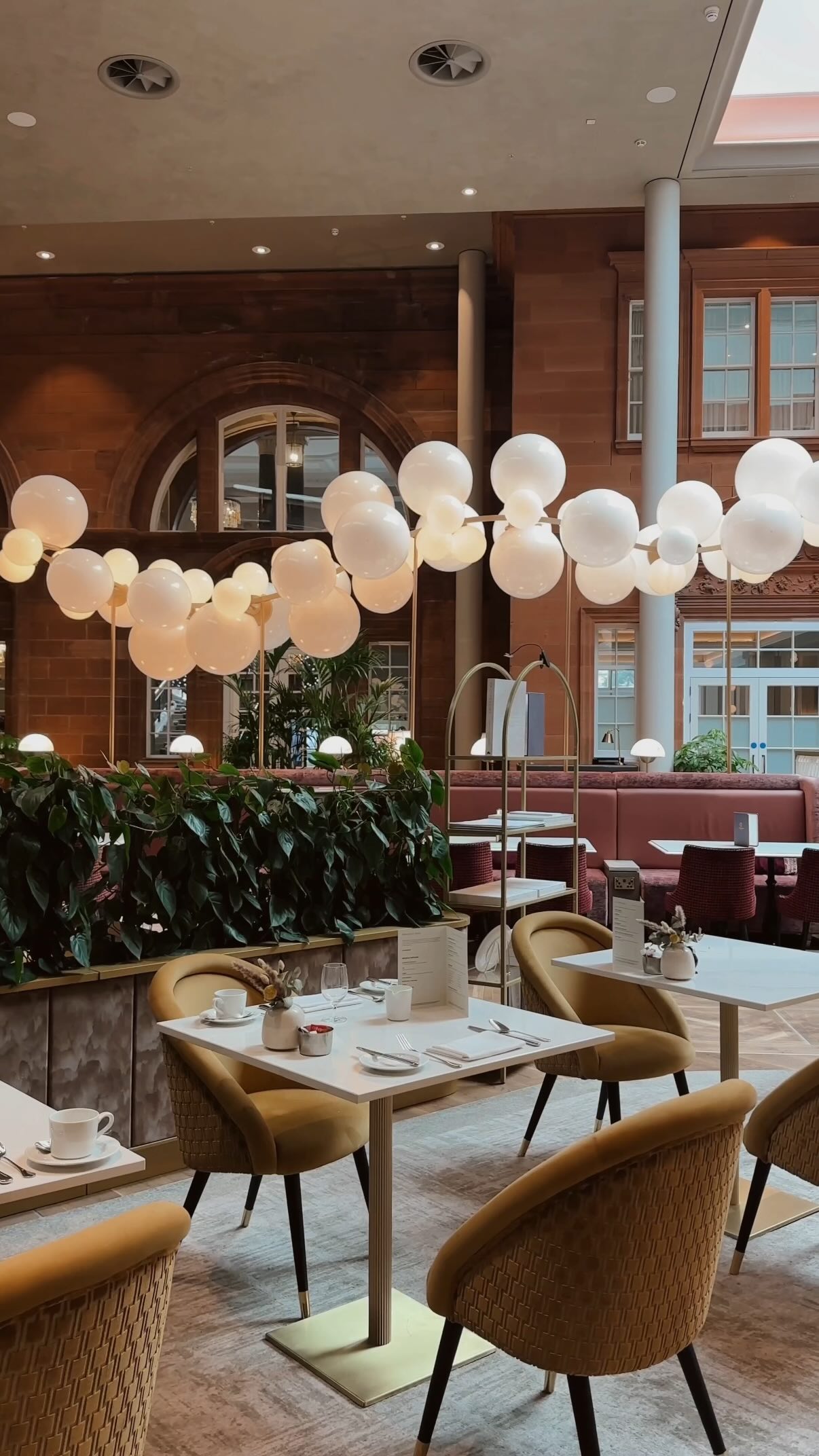 Instagram post by @letsnomnom_ for VisitScotland. Caption reads: @caledonianedinburgh is more than a stay, it’s an....