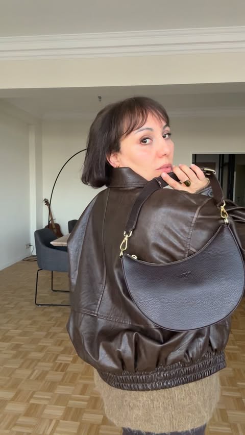 Instagram post by @ismahennedrault for Aarni. Caption reads: My bag is Finnish Elk Leather from @aarniwood is....