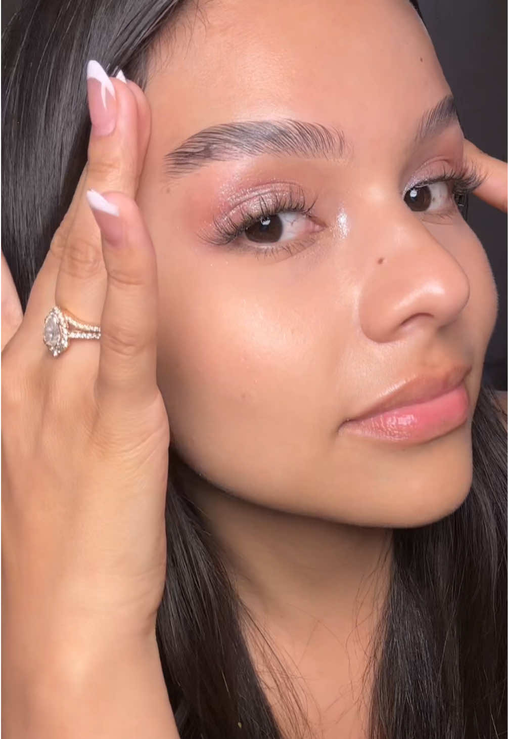 TikTok post by @delacruzmariely for HECI Beauty Makeup. Caption reads: [...] #noflakebrowgel #laminatedbrows ||@HECI....
