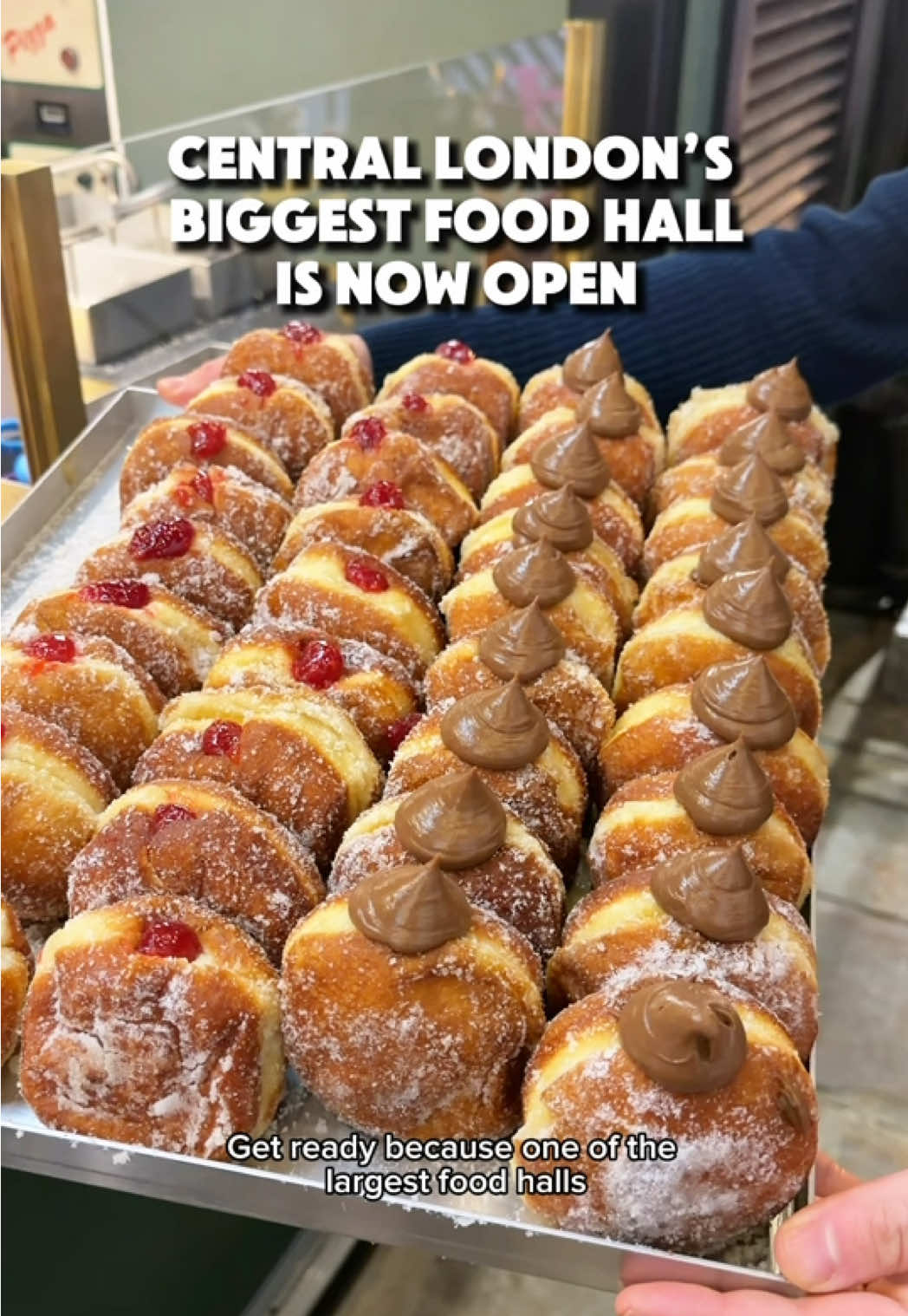 TikTok post by @exploringlondon for Bread Ahead. Caption reads: The LARGEST and most iconic food hall in Central....