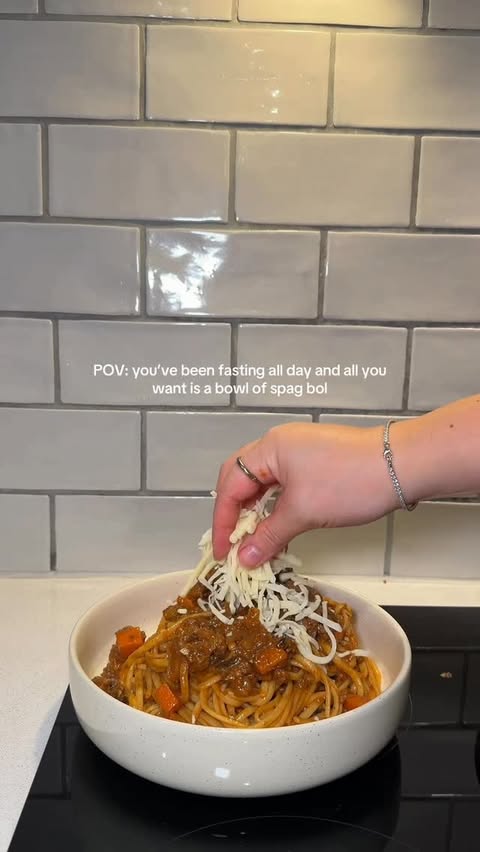 Instagram post by @_cookwithmi for Heinz. Caption reads: [...] Ramadan 🥹🫶🏽 spaghetti bolognese using....