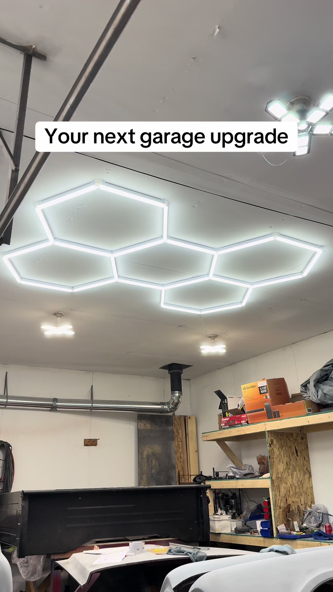 TikTok post by @k1500life for Hyperlite. Caption reads: #hexlights #hyperlite #garagemakeover #autobody....