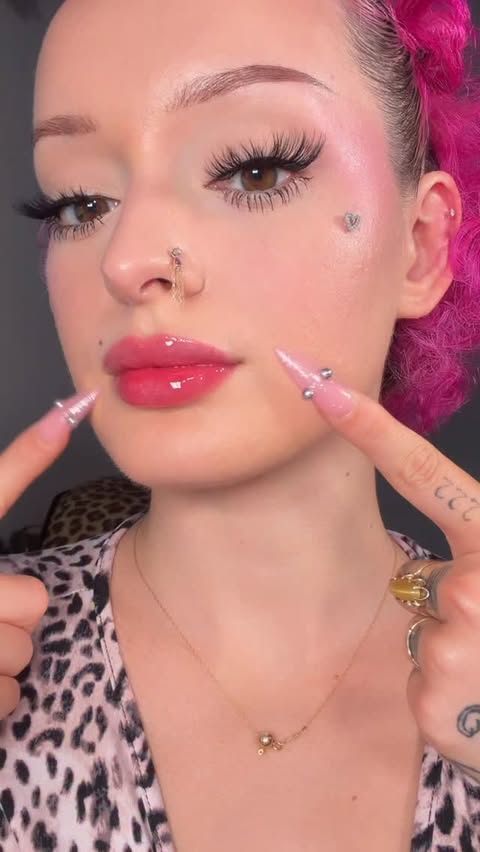 Instagram post by @fluttaflyz for nooni. Caption reads: [...] this lip oil so much 😛💗 #lipoil....