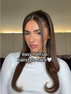 TikTok post by @oliviacrompton for Beauty Works Professional. Caption reads: try this easy half up half down hairstyle hack ✨....
