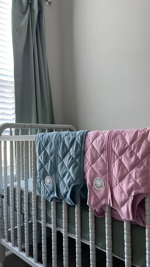 Instagram post by @clarehollowayandco_ for Dreamland Baby. Caption reads: [...] We love our weighted sleep sack from....
