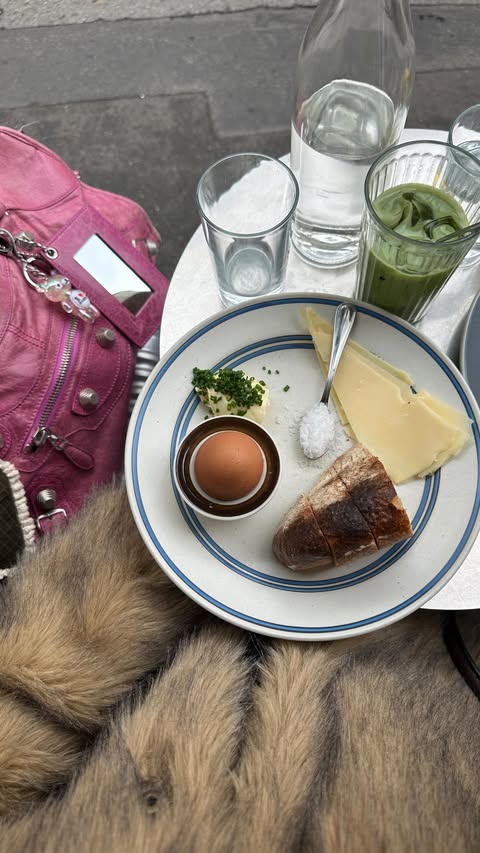 Instagram post by @vitamin__sea_ for NA-KD. Caption reads: one blazer: 4 festive looks with @nakdfashion....