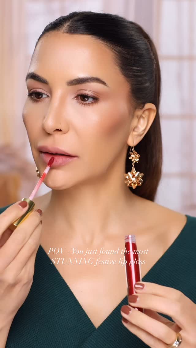 Instagram post by @glamgirlgabi for City Beauty. Caption reads: [...] MOST STUNNING festive lipgloss 🤩 🎄....