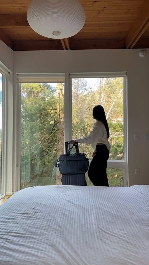 Instagram post by @gabrielleaihara for CALPAK. Caption reads: daydreaming of spring with my @calpak Luka Duffel....