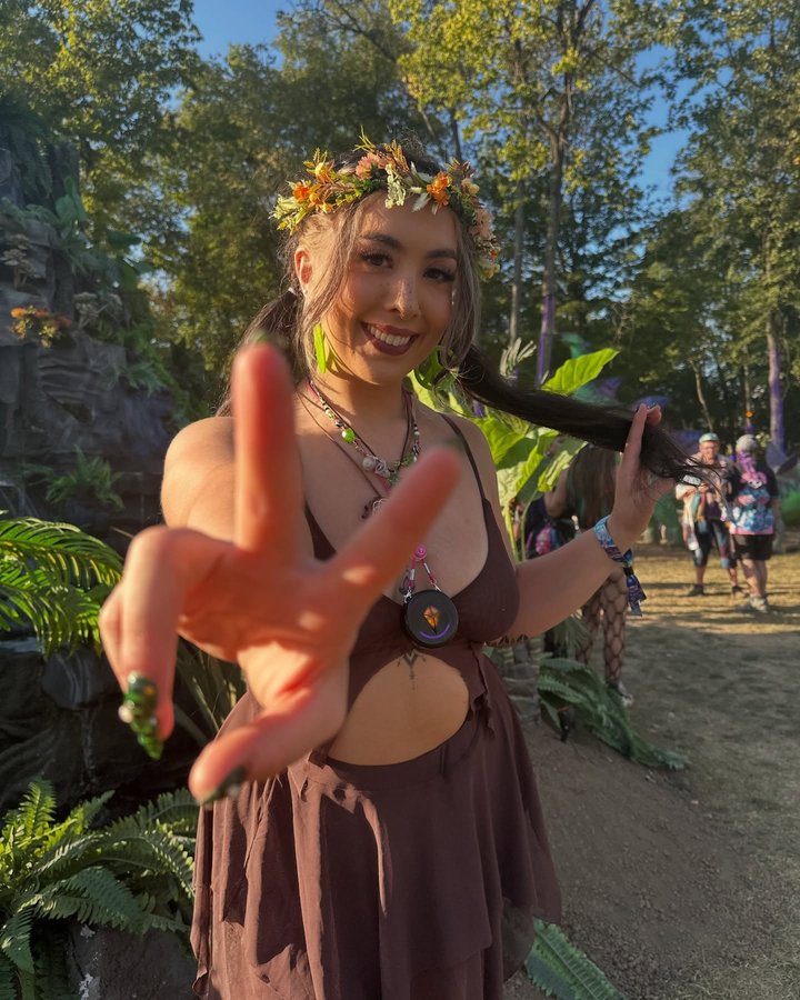 Instagram post by @totem.labs for iHeartRaves. Caption reads: [...] 1 of Lost Lands ⛰️🏞️ 

Outfit from....