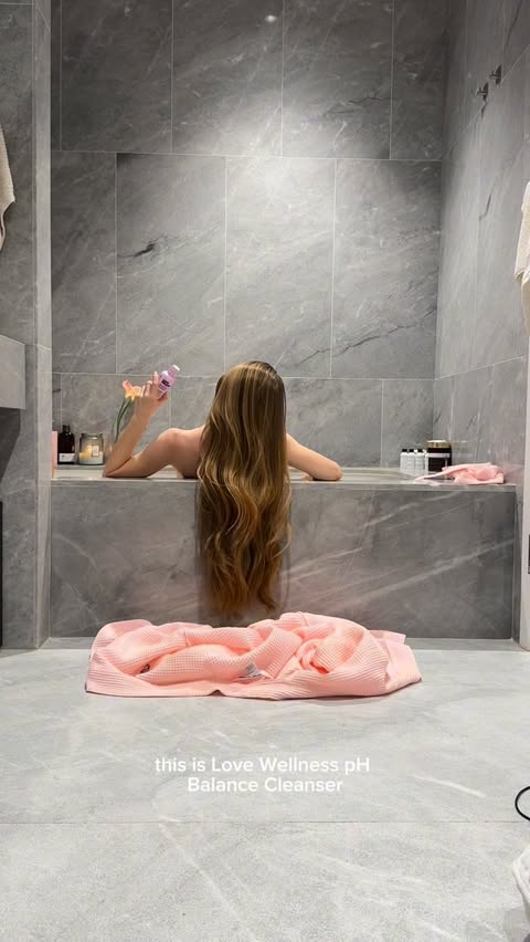 Instagram post by @theviketwins for Love Wellness. Caption reads: [...] for my everything shower @lovewellness....