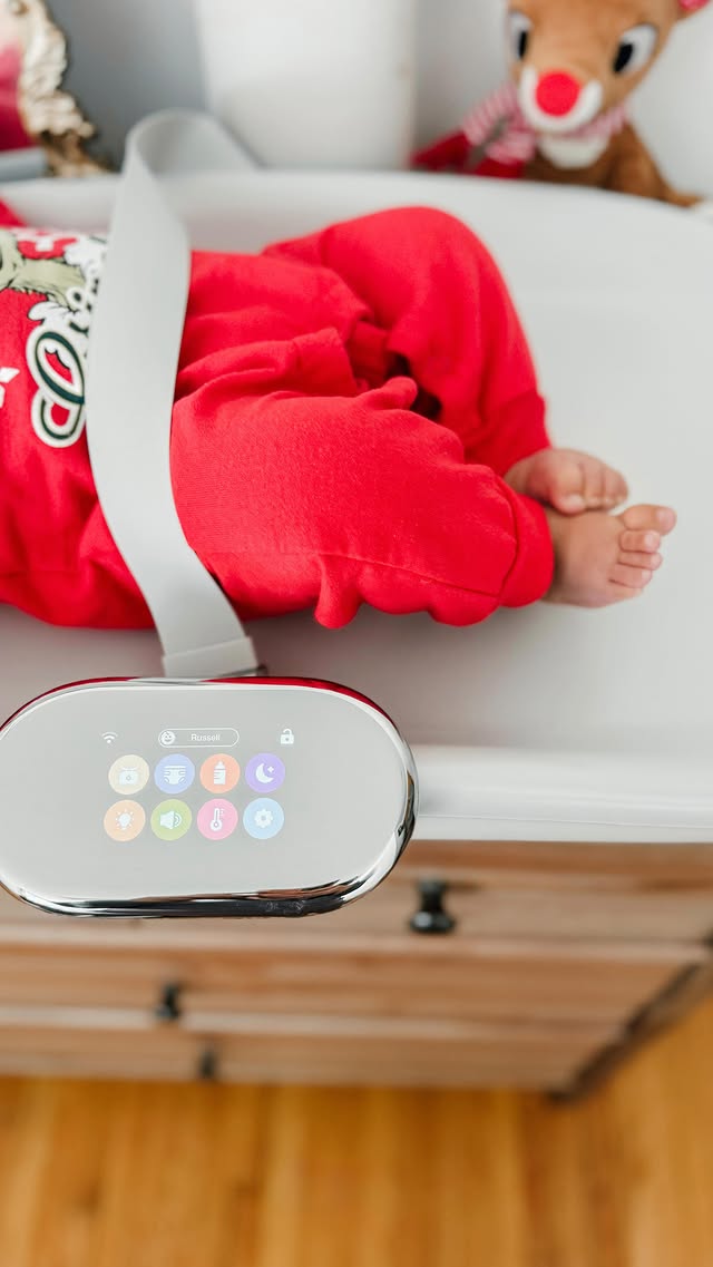 Instagram post by an influencer for Woddle Baby. Caption reads: [...] MUST HAVE baby item — the @woddlebaby smart....