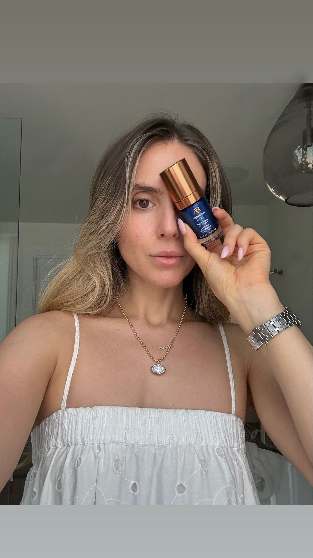 Instagram post by @itsjennarennert for Augustinus Bader. Caption reads: This never goes on sale… @augustinusbader The....