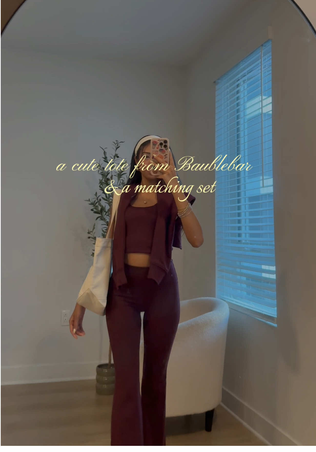 TikTok post by @vickiemnm for BaubleBar. Caption reads: fell in love with my new tote from @BaubleBar....