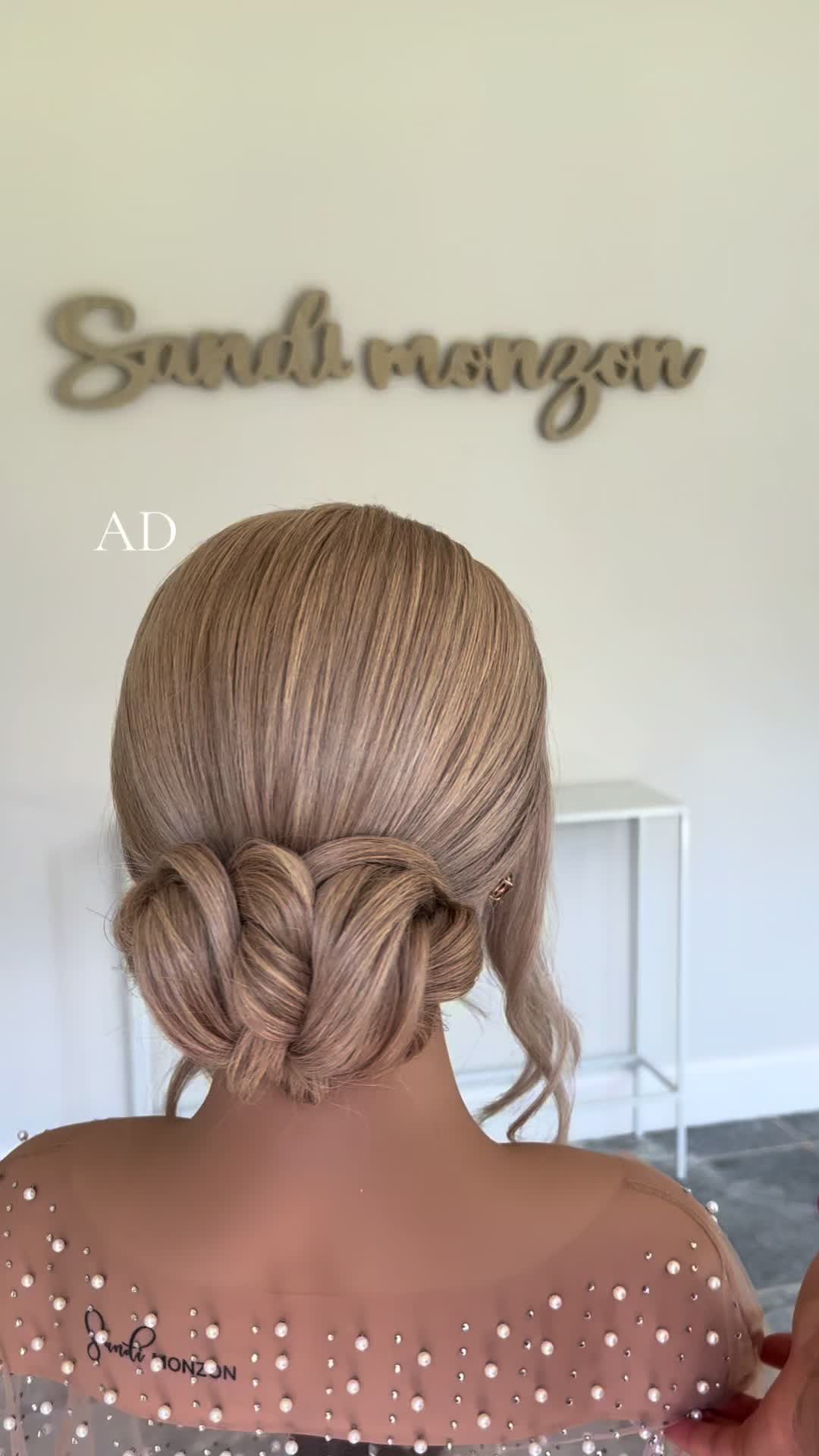 TikTok post by @sandimonzon for DESIGNME Hair. Caption reads: [...] product: Hold.Me styling stick by....