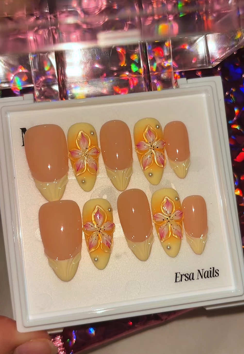 TikTok post by @less1_e for Ersa Nails. Caption reads: [...] is just in right now ☺️💛💛#fyp @Ersa Nails....