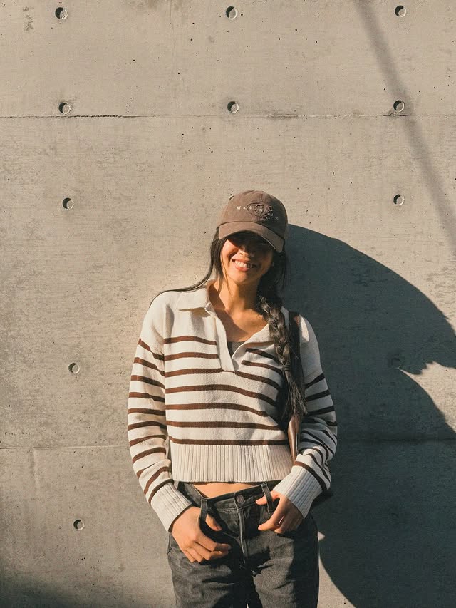 Instagram post by @koki for Coach. Caption reads: Day off with sis 💓

Outfit 
Cap and bag @coach ❤️.