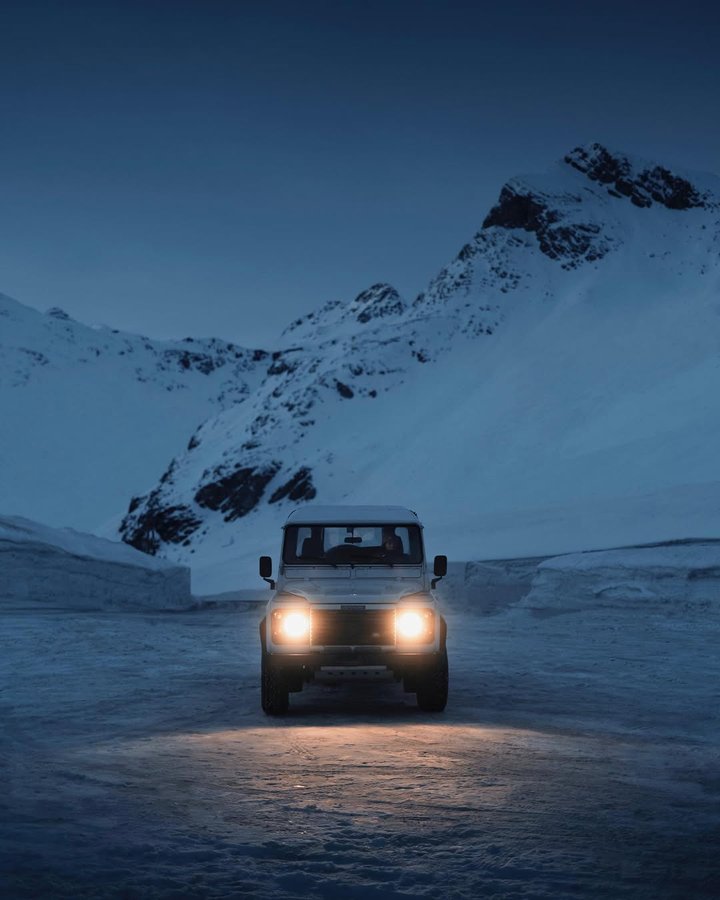 Instagram post by @jonglr for Discover Earth. Caption reads: Some stills from the blue hour at the Berninapass....
