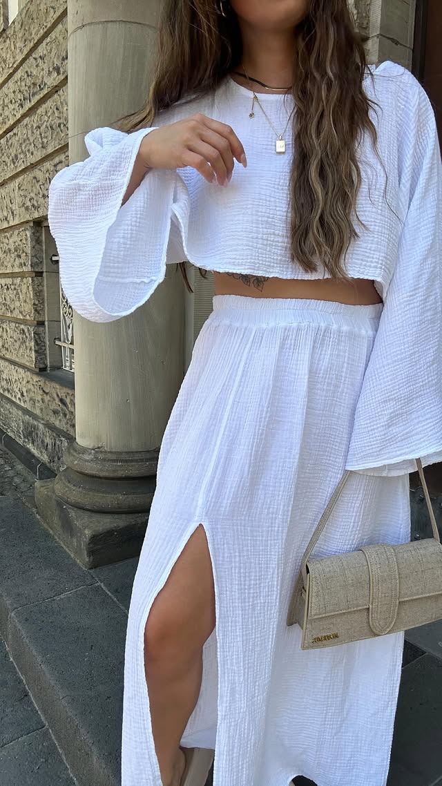 Instagram post by @krissiklr for PAUL VALENTINE. Caption reads: Summer chill day Outfit 🕊️🤍

#summervibes....