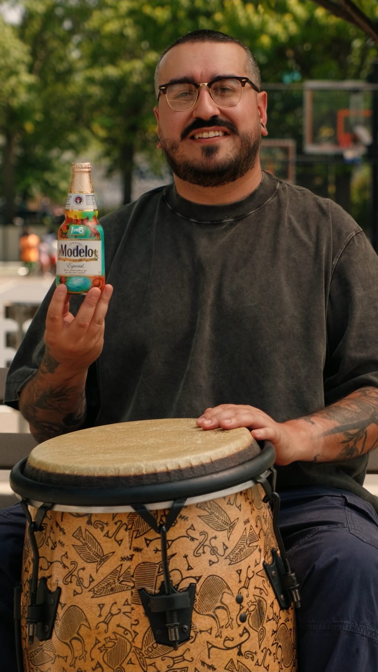 Instagram post by @devonrodriguezart for Modelo USA. Caption reads: [...] life for Hispanic Heritage Month with....