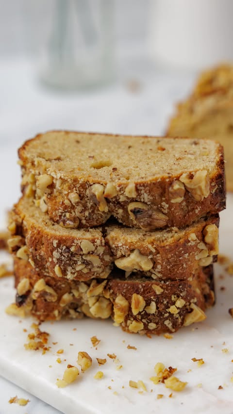 Instagram post by @olivia.wyles for Keto Chow. Caption reads: This banana bread has a soft, fluffy texture and....