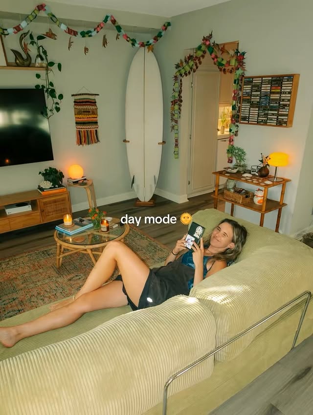 Instagram post by @jess.cliftonn for OMHU. Caption reads: me and my couch: a love story @omhu_cph #ad.