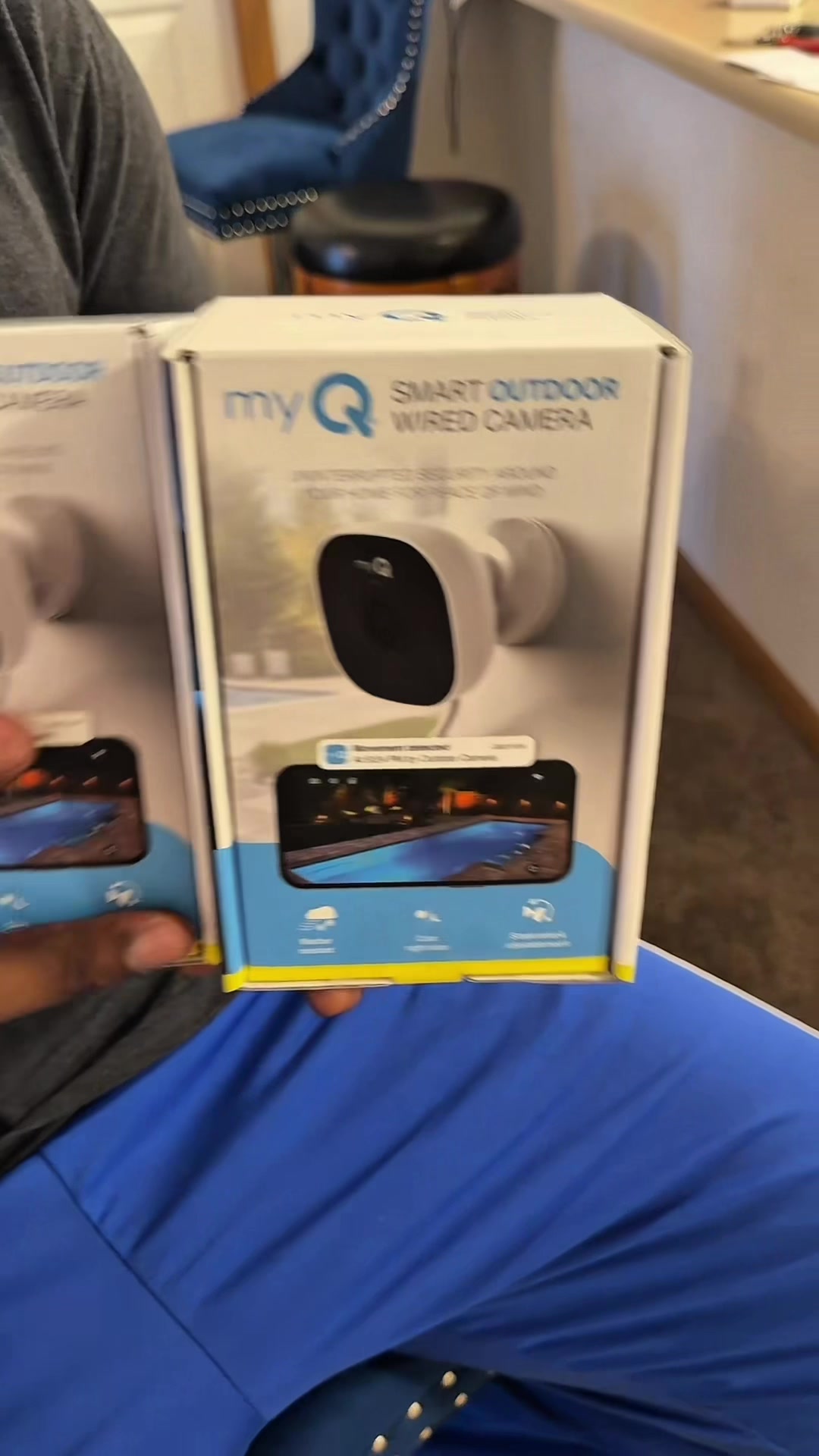 TikTok post by @chrisinno042 for myQ. Caption reads: myQ Smart Outdoor Wired Security Camera 2 Pack....