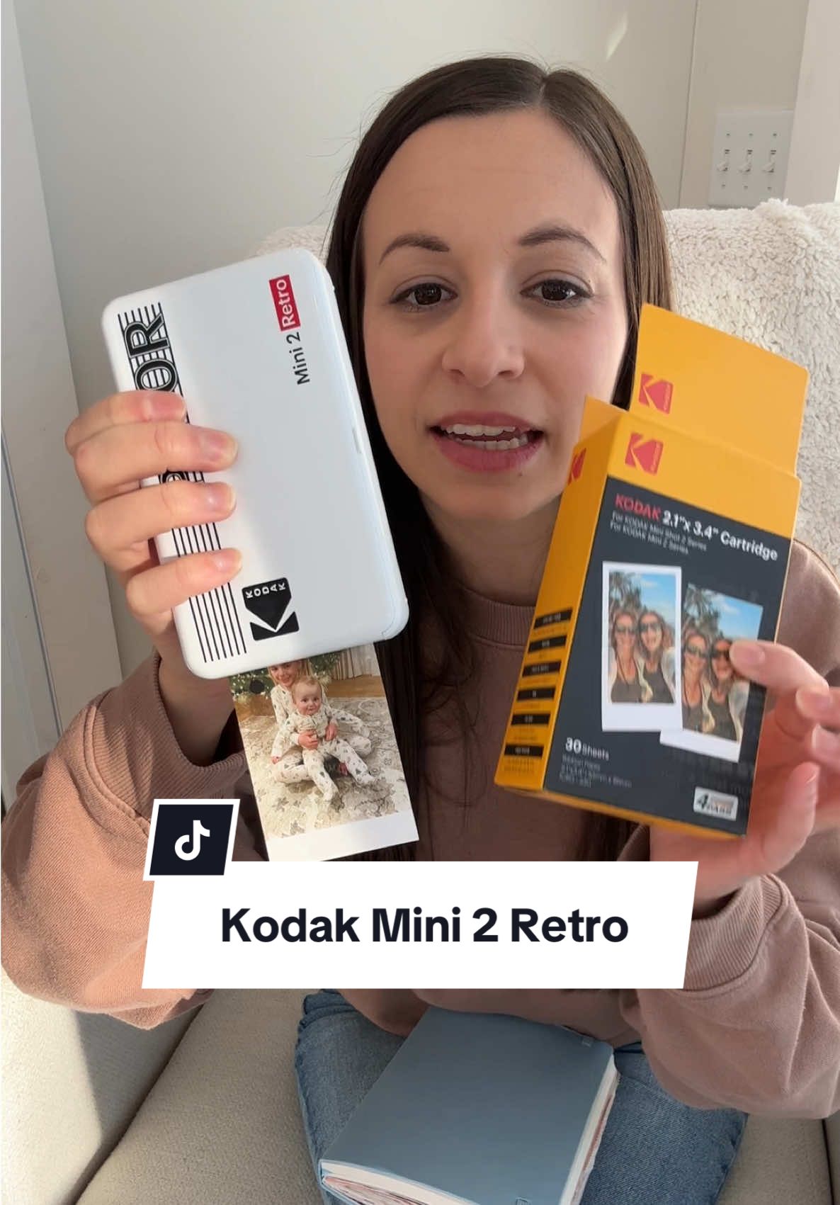 TikTok post by @kateandbabes for Kodak Photo Printer. Caption reads: [...] #kodak #photoprinter @Kodak Photo Printer.