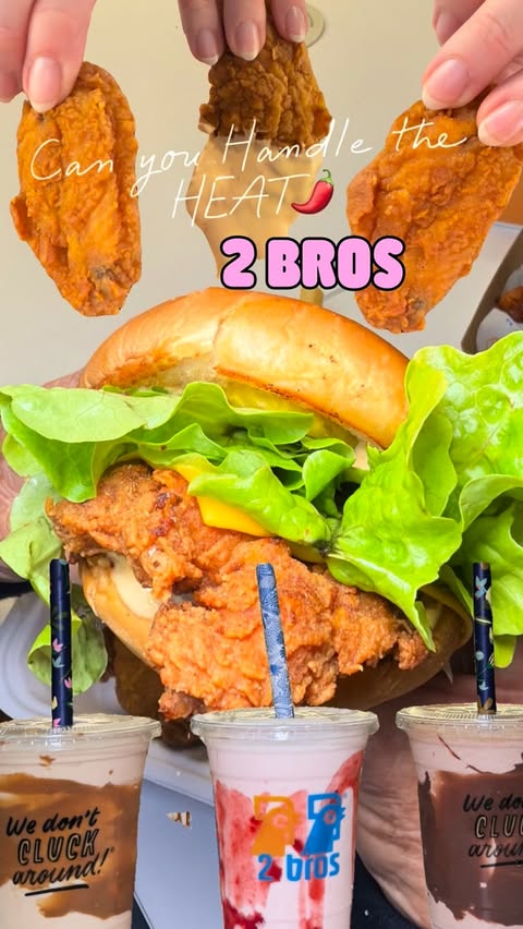 Instagram post by @feastingwithzen for Queensland Foodies Network. Caption reads: 🌶️ Think you can handle the heat? 2 Bros is....