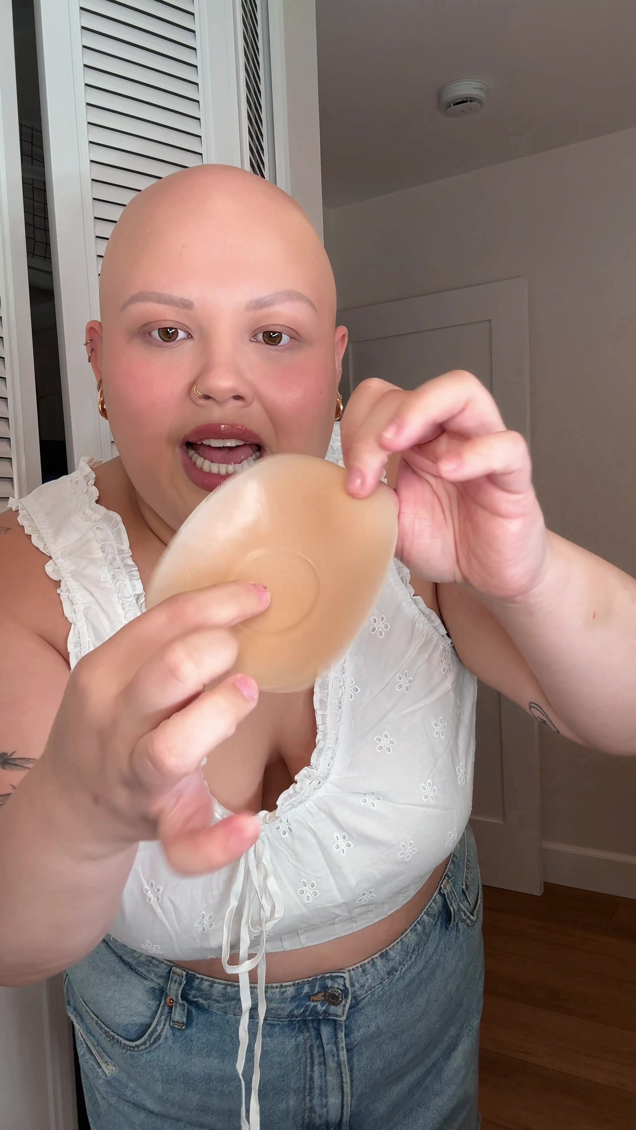 TikTok post by @baldiechi for Alexander Jane. Caption reads: wearing sticky Cakes in size DDD+ shade honey 🍒🍯....