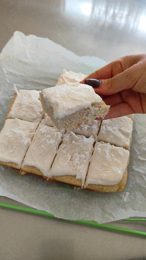 Instagram post by @jemma.nutritionist for Natvia. Caption reads: Coconut Snacking Cake 🥥🩷

This is perfect for....