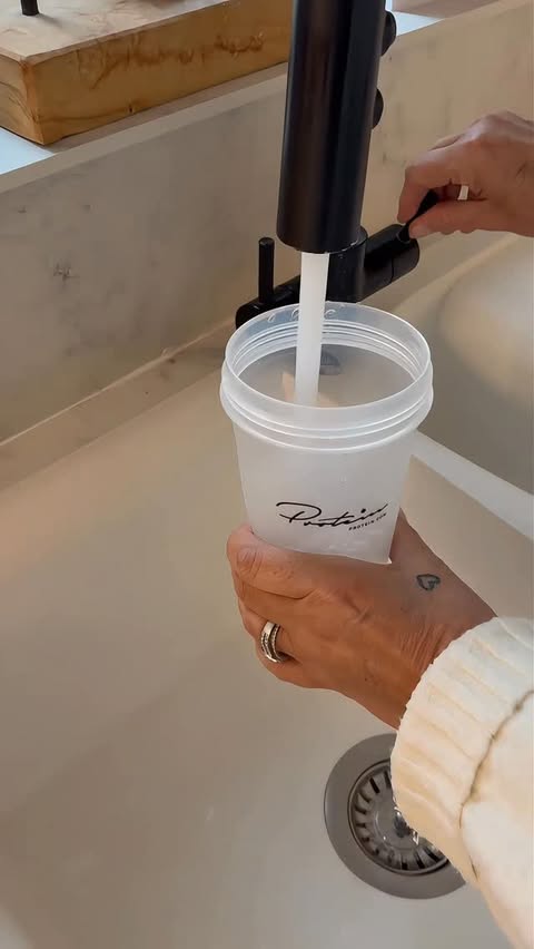 Instagram post by @therese_ryan_ for Protein.com. Caption reads: [...] cocktail. 🍍🥥 You can grab yours at....