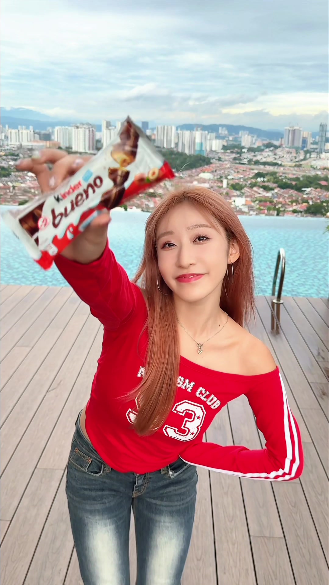 TikTok post by @angeline_teo for Kinder. Caption reads: Dance Hi+Fiv3 with me 💃🏻 for a chance to fly to....