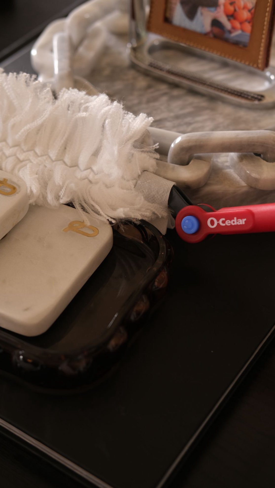 Instagram post by @meandmr.jones for O-Cedar. Caption reads: [...] keeping it ready for showings with the....