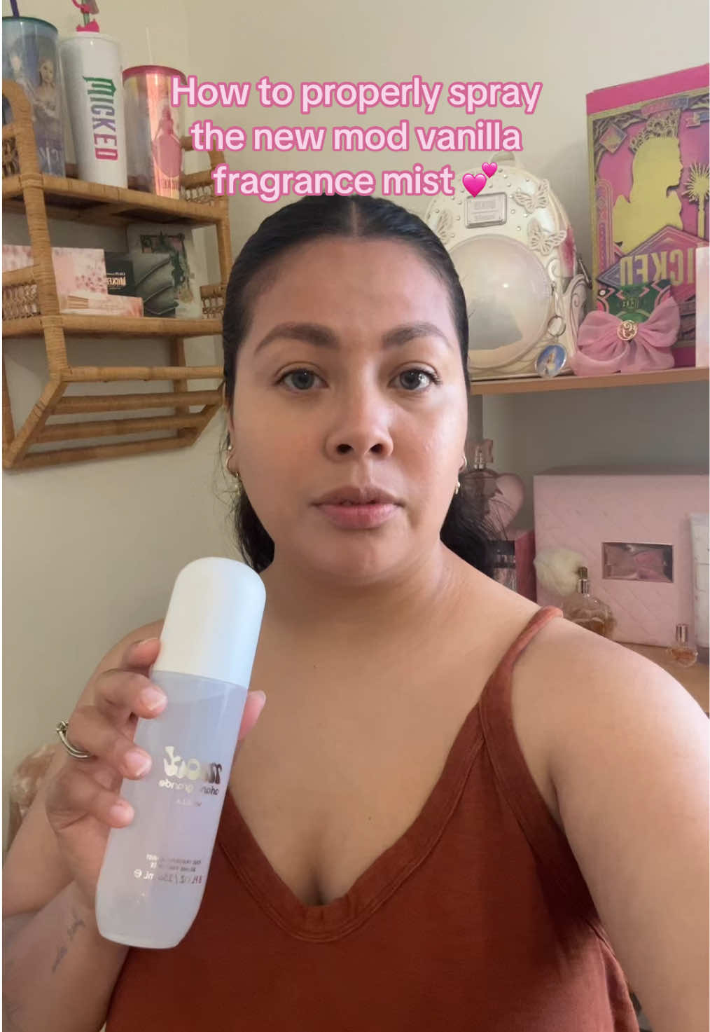 TikTok post by @esmeraldamariecarrillo for Ariana Grande Fragrances. Caption reads: [...] this new fragrance mist from @Ariana Grande....